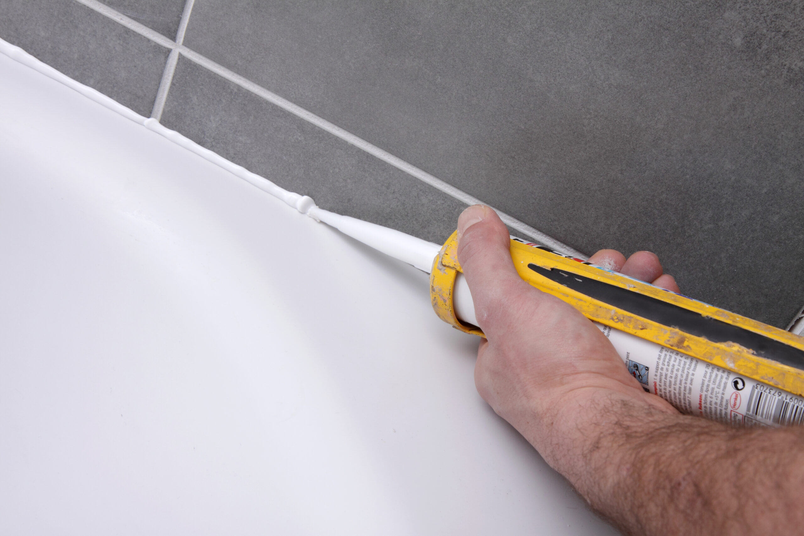 mains posant silicone